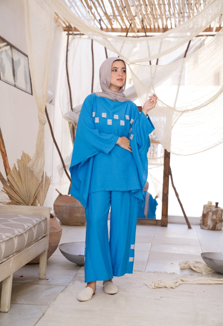 Discover Sublime Elegance with our Blue and Beige Blouse! 🕊️🌊