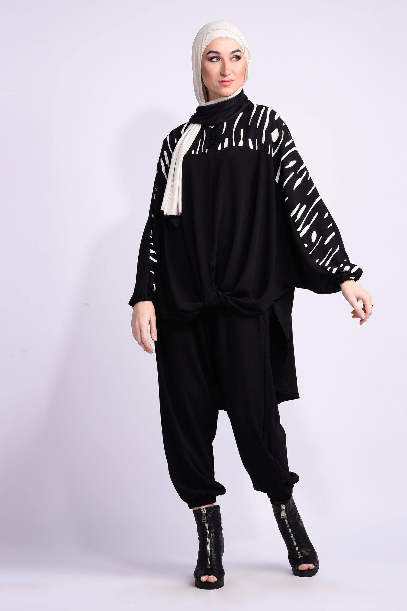 Black oversized blouse with white print and loose sleeves
