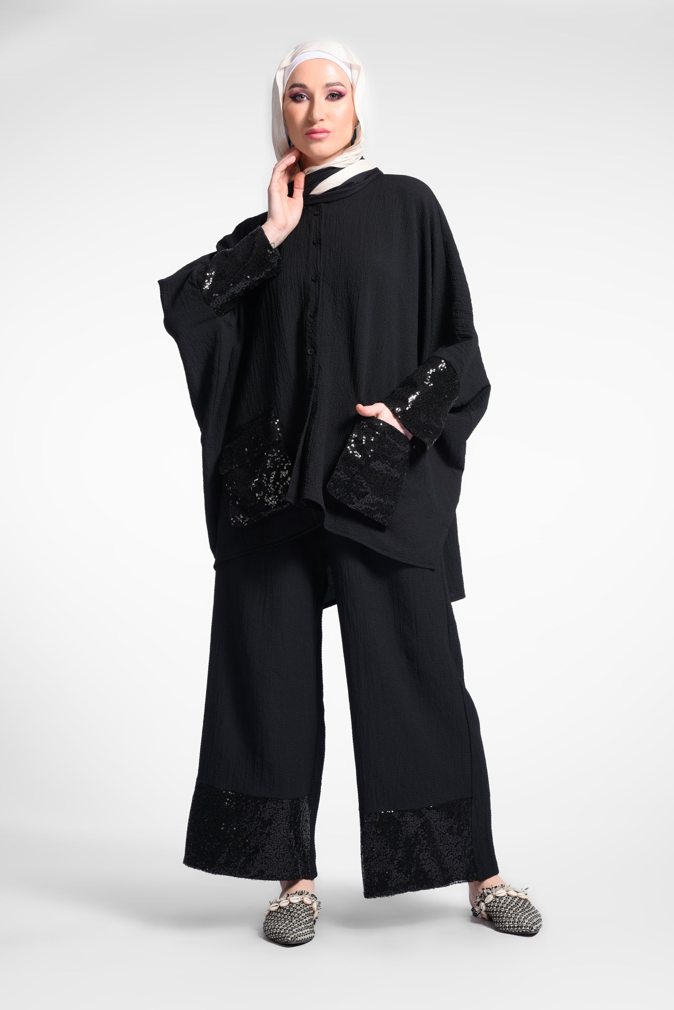 Black oversized blouse with pockets