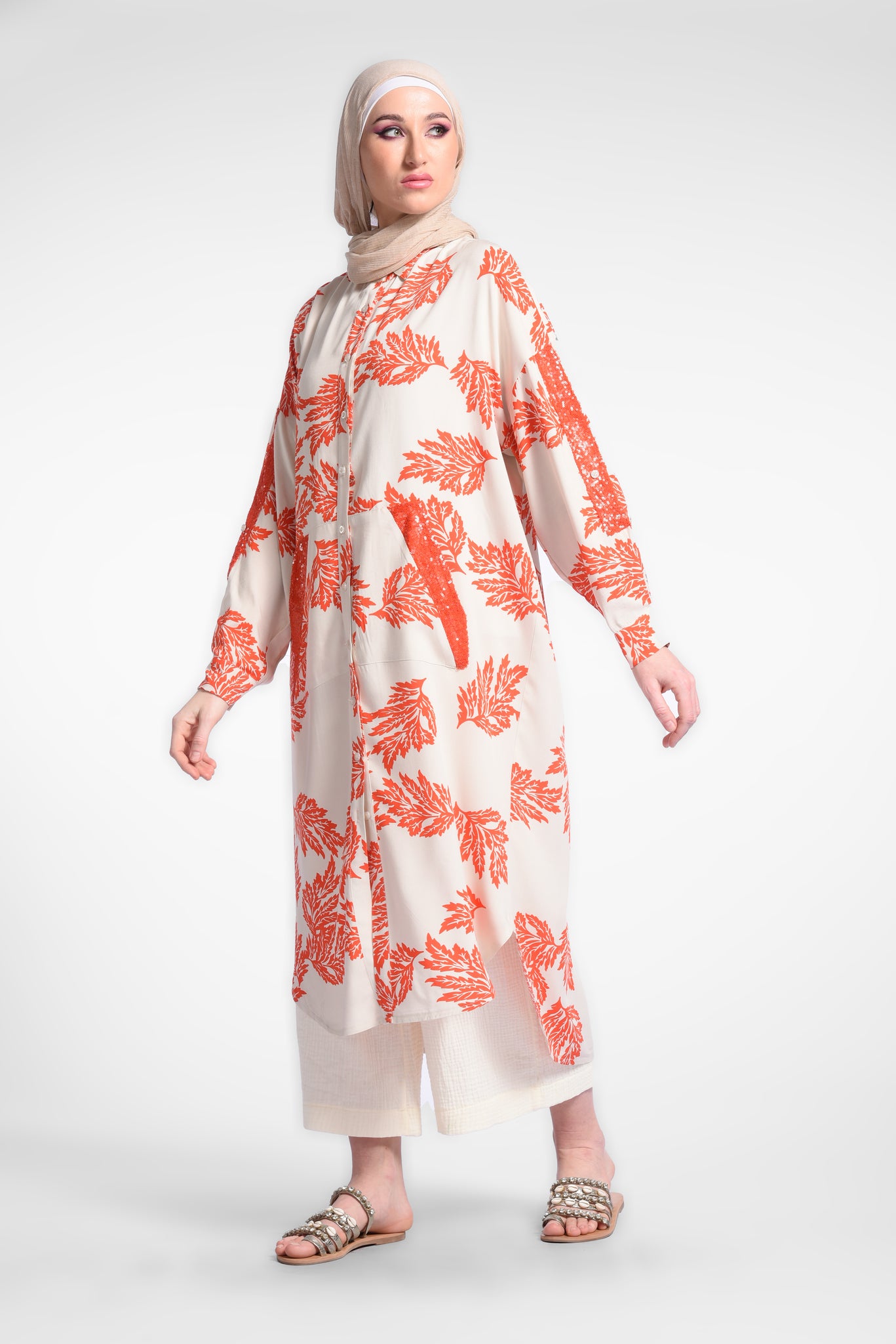 Orange printed midi dress with long sleeves