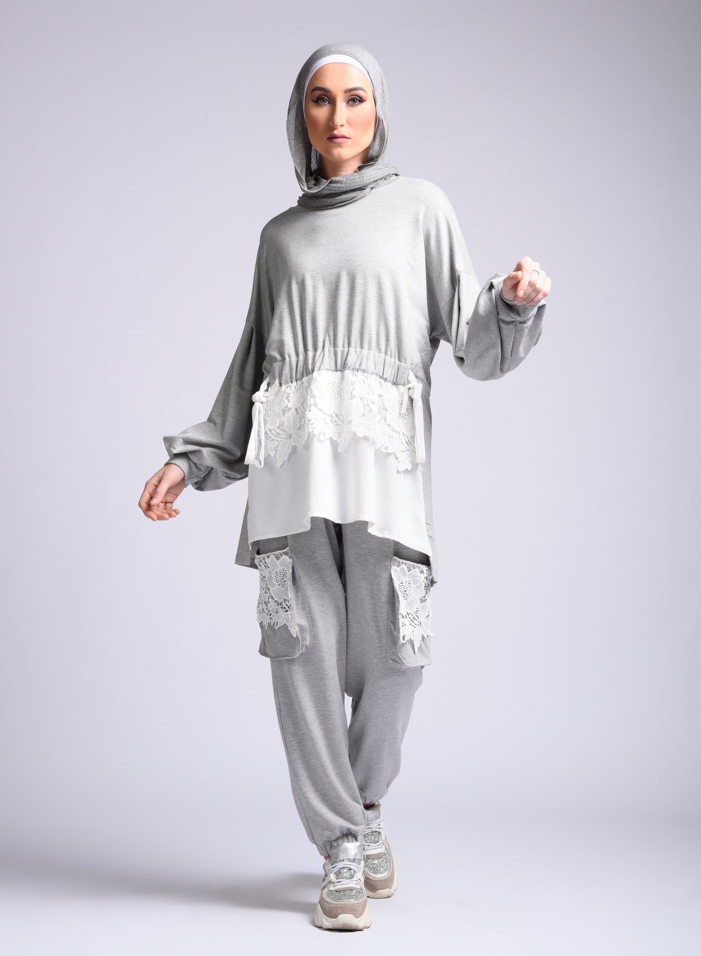 gray ruffled long-sleeved blouse