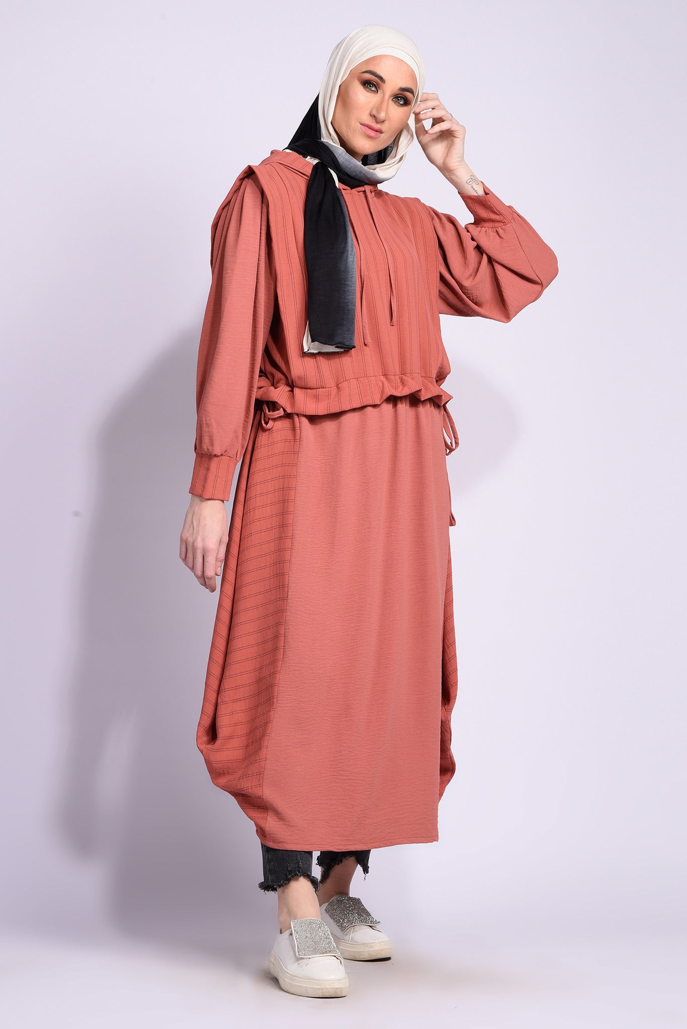 Orange dress with tie at the waist with ruffles