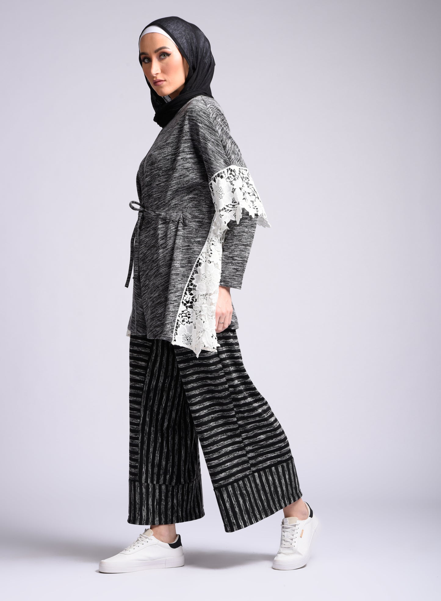 Black long-sleeved blouse with tie