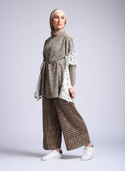 beige long-sleeved blouse with tie