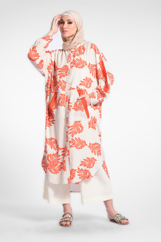 Orange printed midi dress with long sleeves